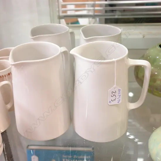 4 C.L. WHITE JUGS