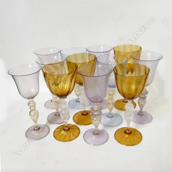 A harlequin set of 12 Murano glass wine goblets
