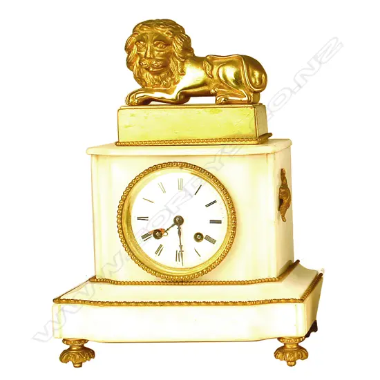 A 19thC French and ormolu and white alabaster mantel clock