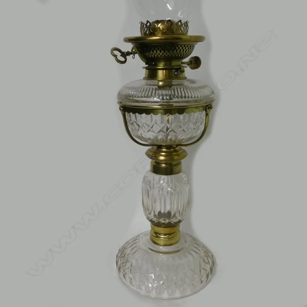 A cut crystal and brass kerosene lamp Image 1++