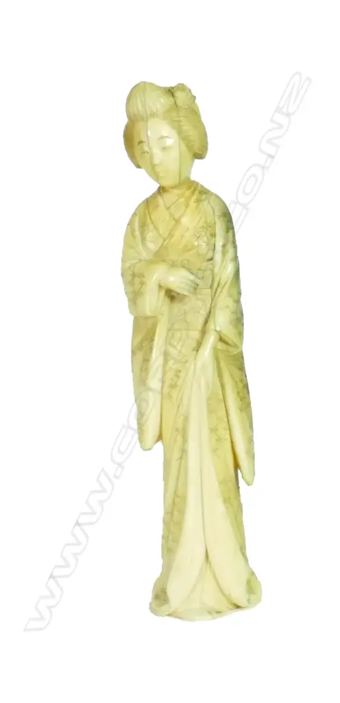 A Meiji period Japanese carved marine ivory figure of a geisha Image 1++