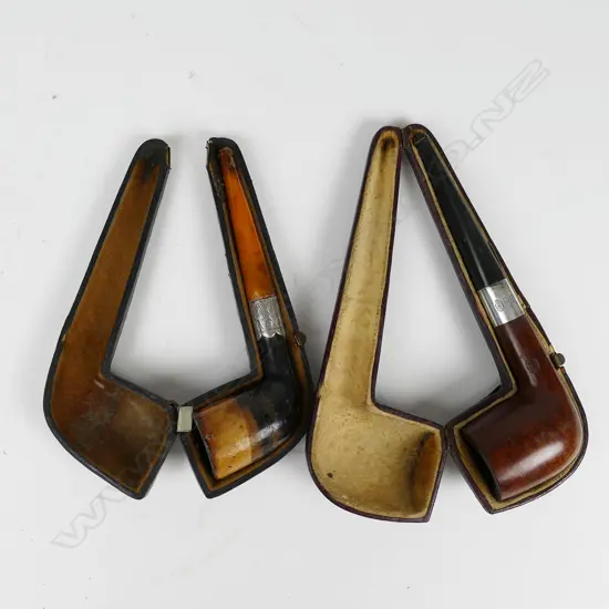 2 ANTIQUE CASED PIPES, AMBER? & SILVER FITTINGS