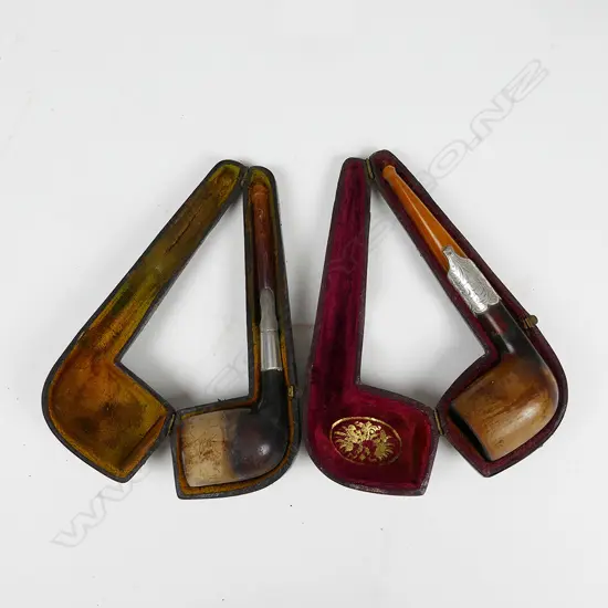 2 ANTIQUE CASED PIPES, AMBER? & SILVER FITTINGS