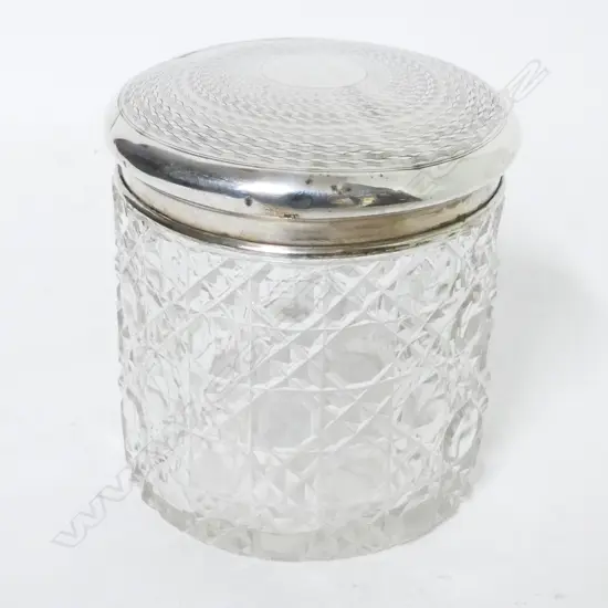A silver and crystal dressing table pot