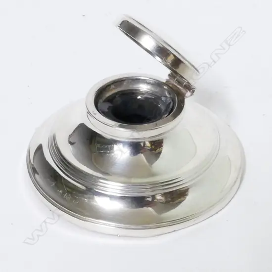 A silver inkwell