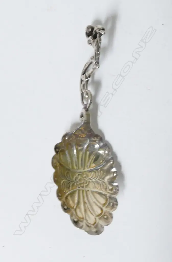 A 19thC Dutch fancy cast silver caddy spoon Image 1++