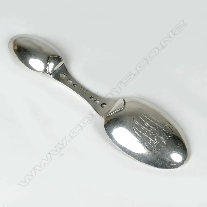 An early 20thC American silver folding spoon Image 1++