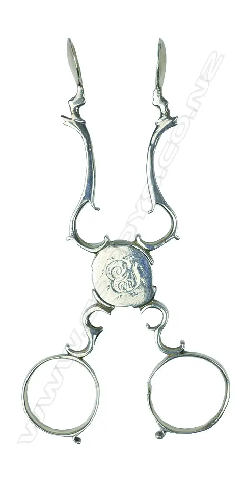 A pair of early George III silver action sugar nips Image 1++