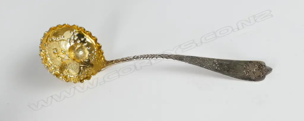 A George III sugar sifter ladle Image 1++