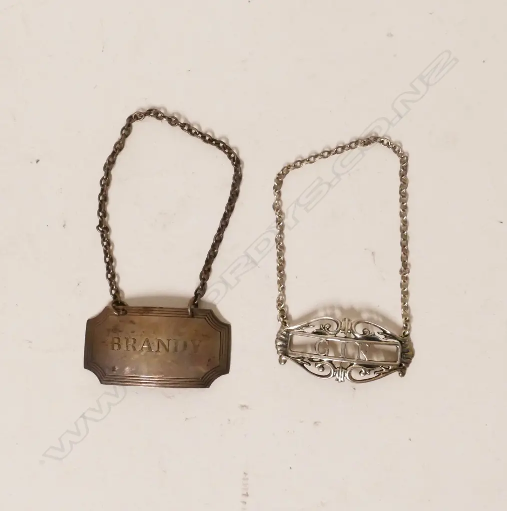 Two silver decanter tickets Image 1++