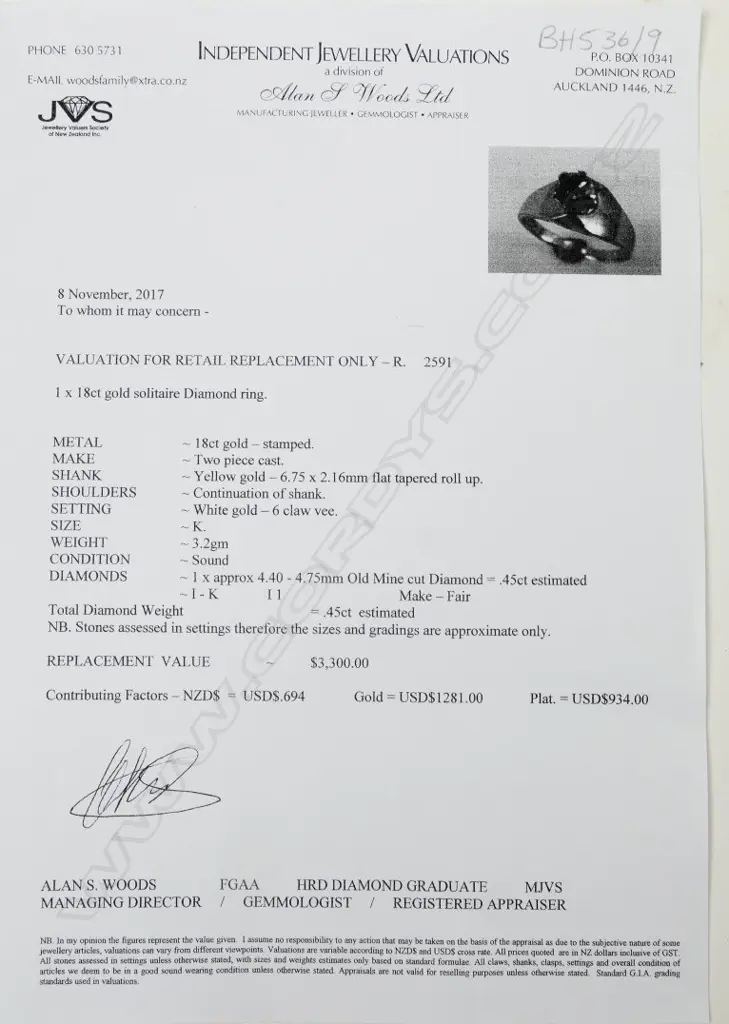 An 18ct. gold and diamond solitaire ring Image 1++