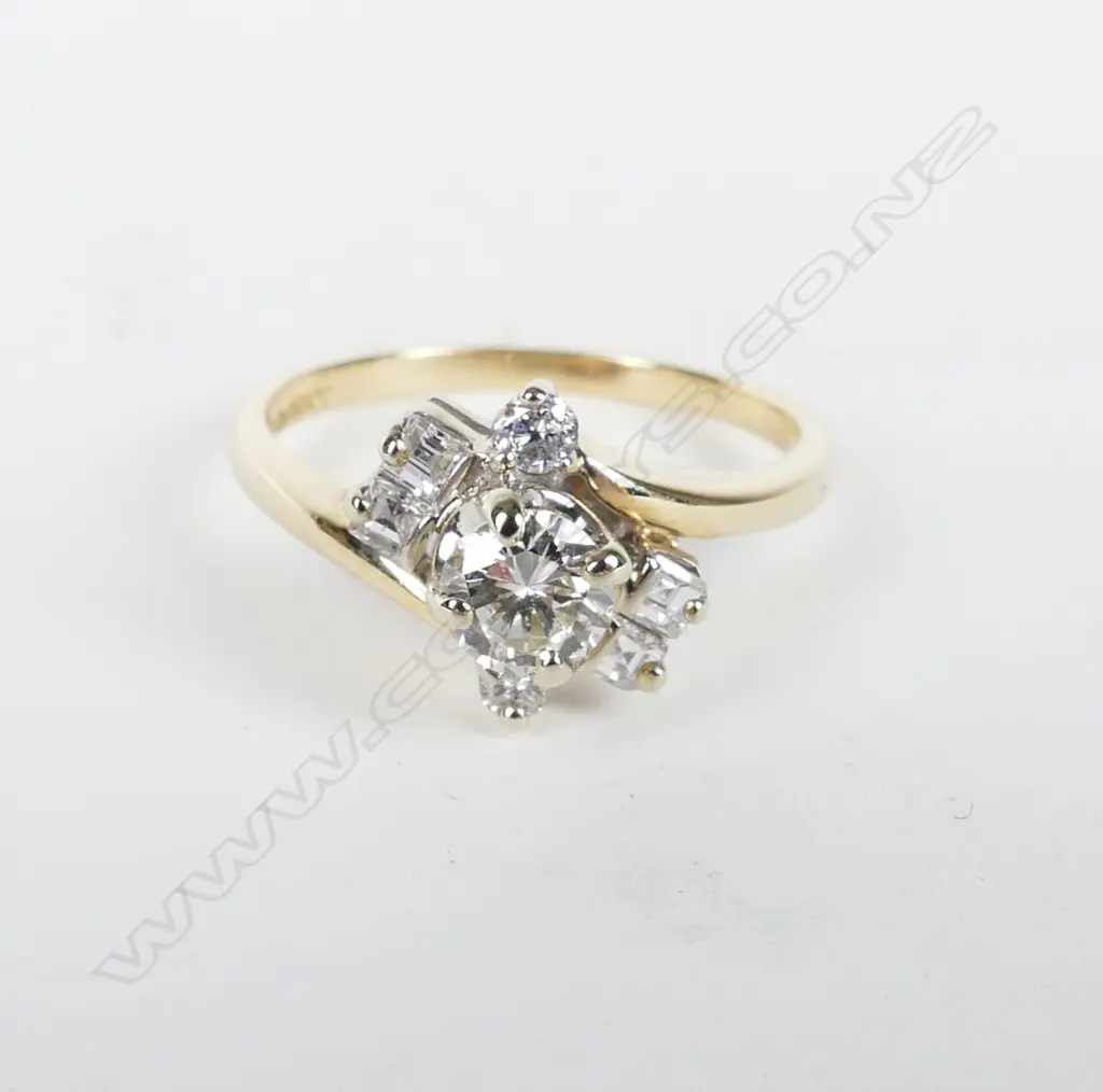 A 14ct. gold and diamond cluster ring Image 1++