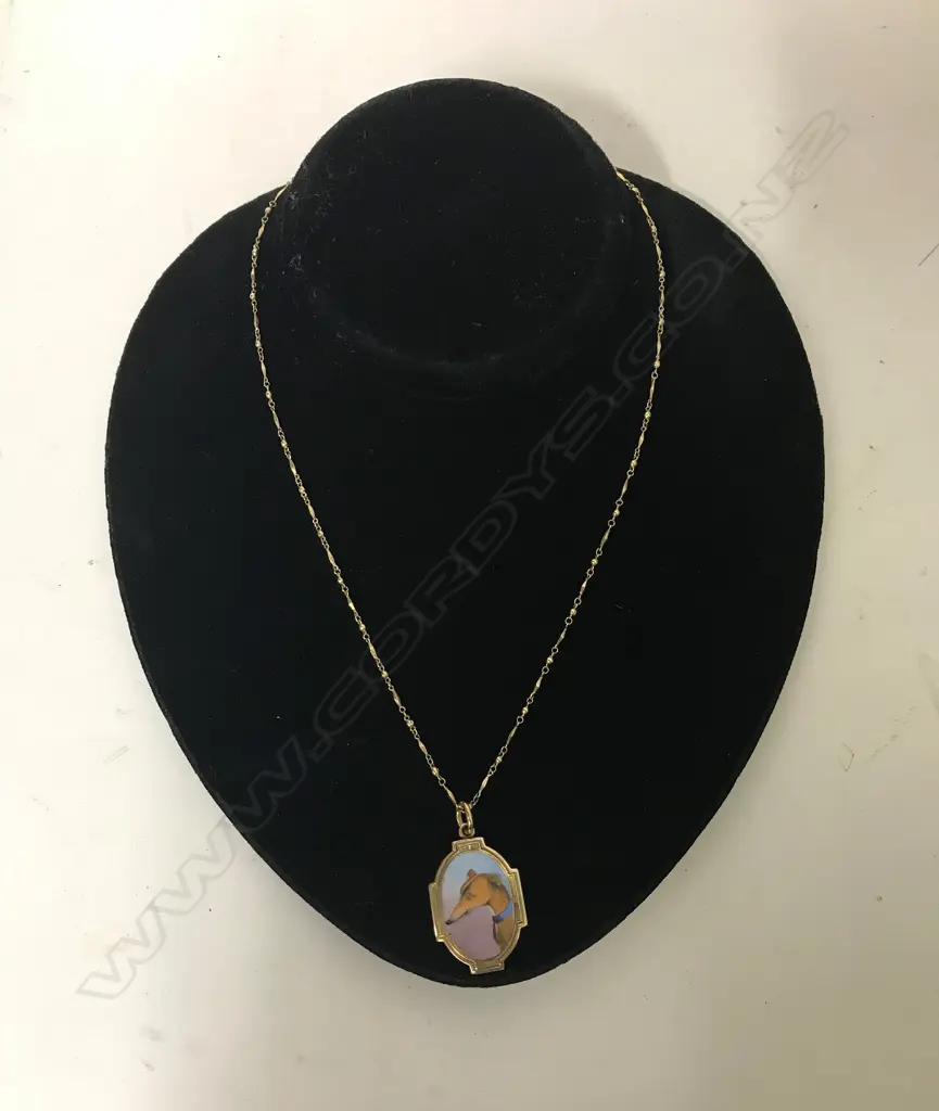 A  Victorian gold and enamel dog pendant Image 1++