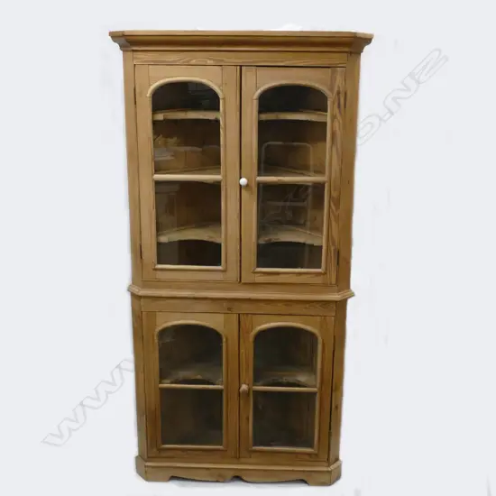 A Victorian pine two-stage standing corner cabinet