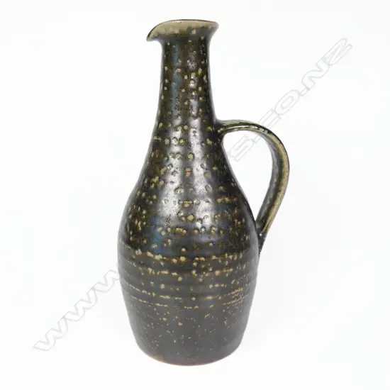 Mirek Smisek (1925-2013) early manganese salt glazed slender pouring bottle,