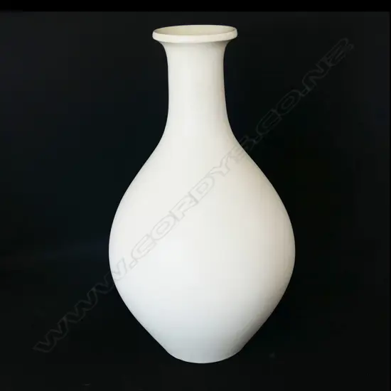 A hand potted white Crown Lynn vase,