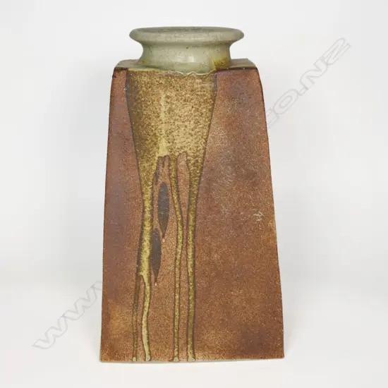 A slab built vase with poured glaze,
