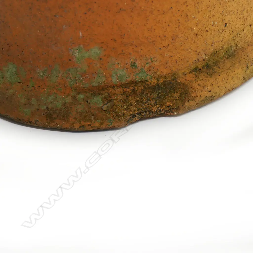 Barry Brickell (1935-2016) wood fired terracotta sculpture. A hand built anthropomorphic form morphing into a hatted bust, lower section of the stylised leg form with curved base. Unglazed with natural kiln firing variation. Chip and surface loss to foot edge. H.1250mm, Image 1++