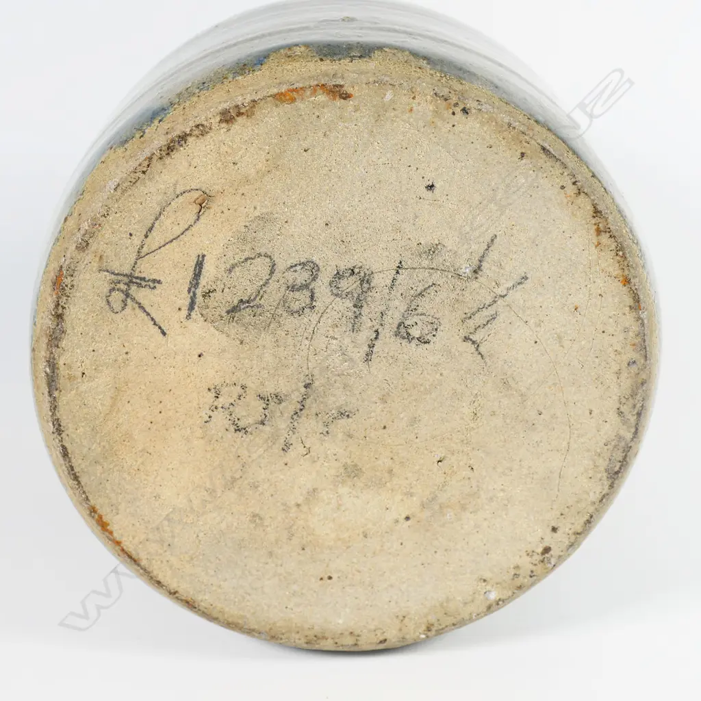 Barry Brickell (1935-2016) flagon; ash grey glazed bell form with tenmoko glazed strap handle and spout. Maker's mark to handle's base. H.200mm Dia.150mm Image 1++