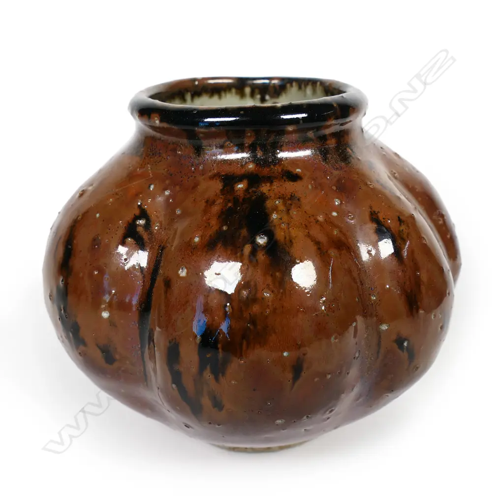 Barry Brickell (1935-2016) lustrous tenmoko glazed squat lobbed vase. Potter's mark lower side. H.100mm. Image 1++