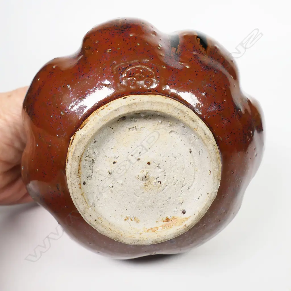 Barry Brickell (1935-2016) lustrous tenmoko glazed squat lobbed vase. Potter's mark lower side. H.100mm. Image 1++