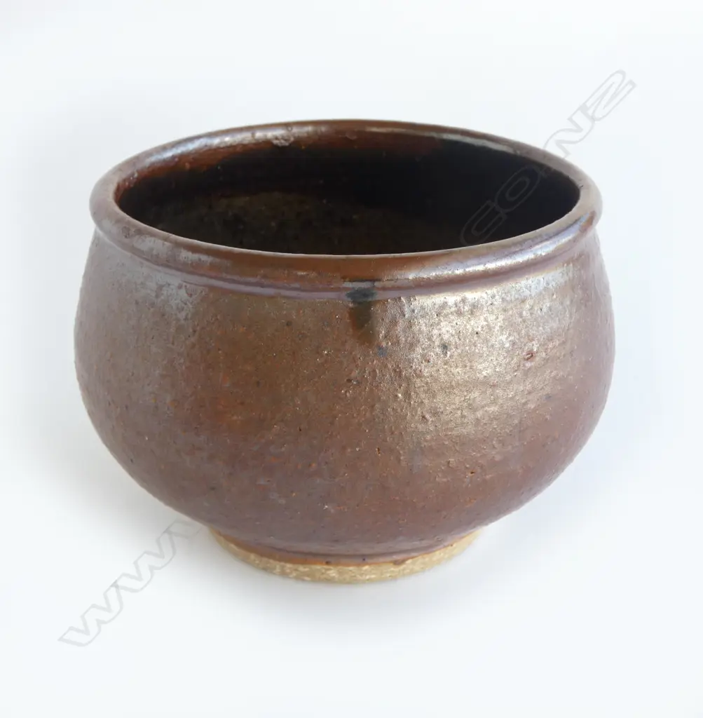 Barry Brickell (1935-2016) small footed bowl with matte brown exterior and glazed interior. Impressed mark lower side. H.85mm Image 1++
