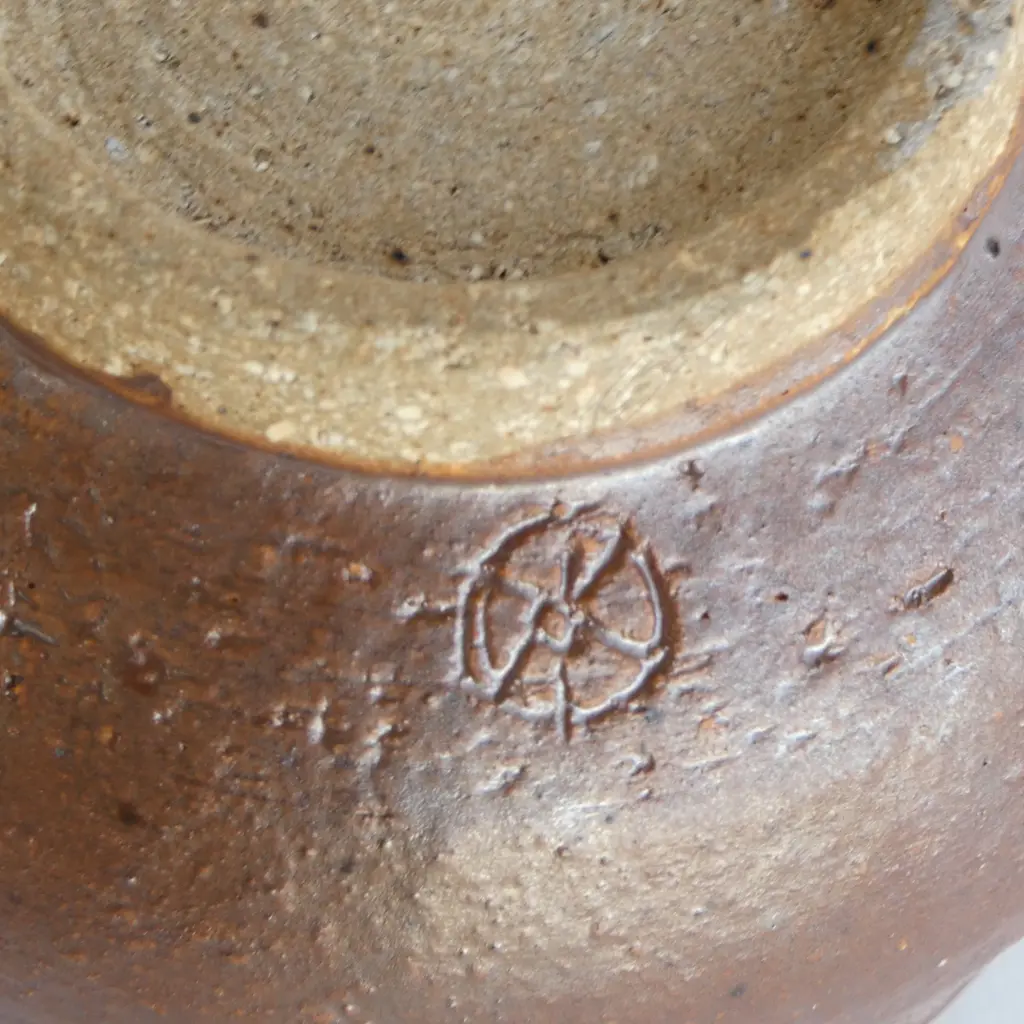 Barry Brickell (1935-2016) small footed bowl with matte brown exterior and glazed interior. Impressed mark lower side. H.85mm Image 1++