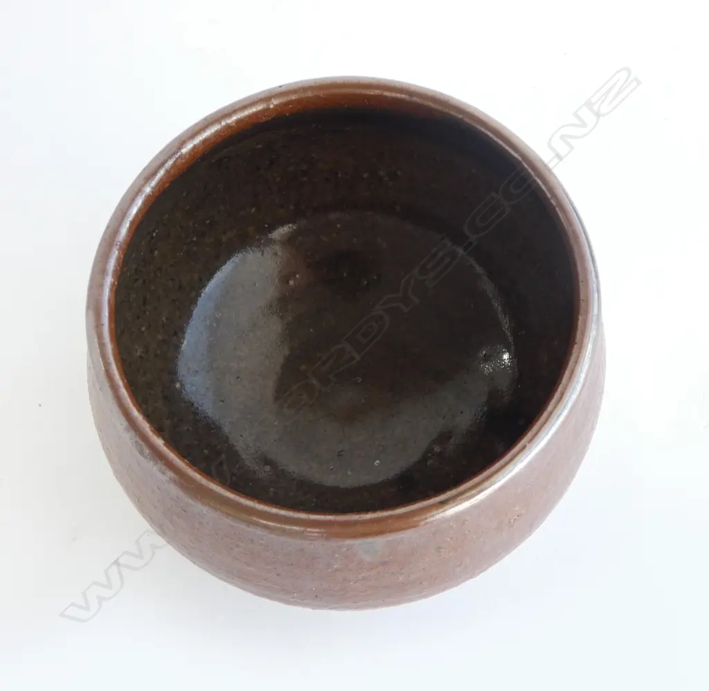 Barry Brickell (1935-2016) small footed bowl with matte brown exterior and glazed interior. Impressed mark lower side. H.85mm Image 1++