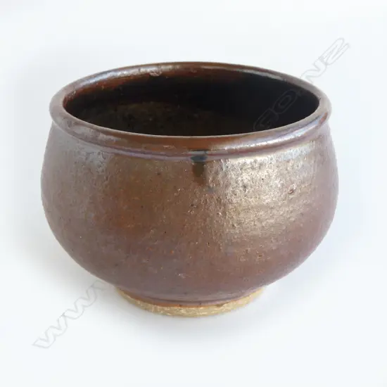 Barry Brickell (1935-2016) small footed bowl with matte brown exterior and glazed interior. Impressed mark lower side. H.85mm