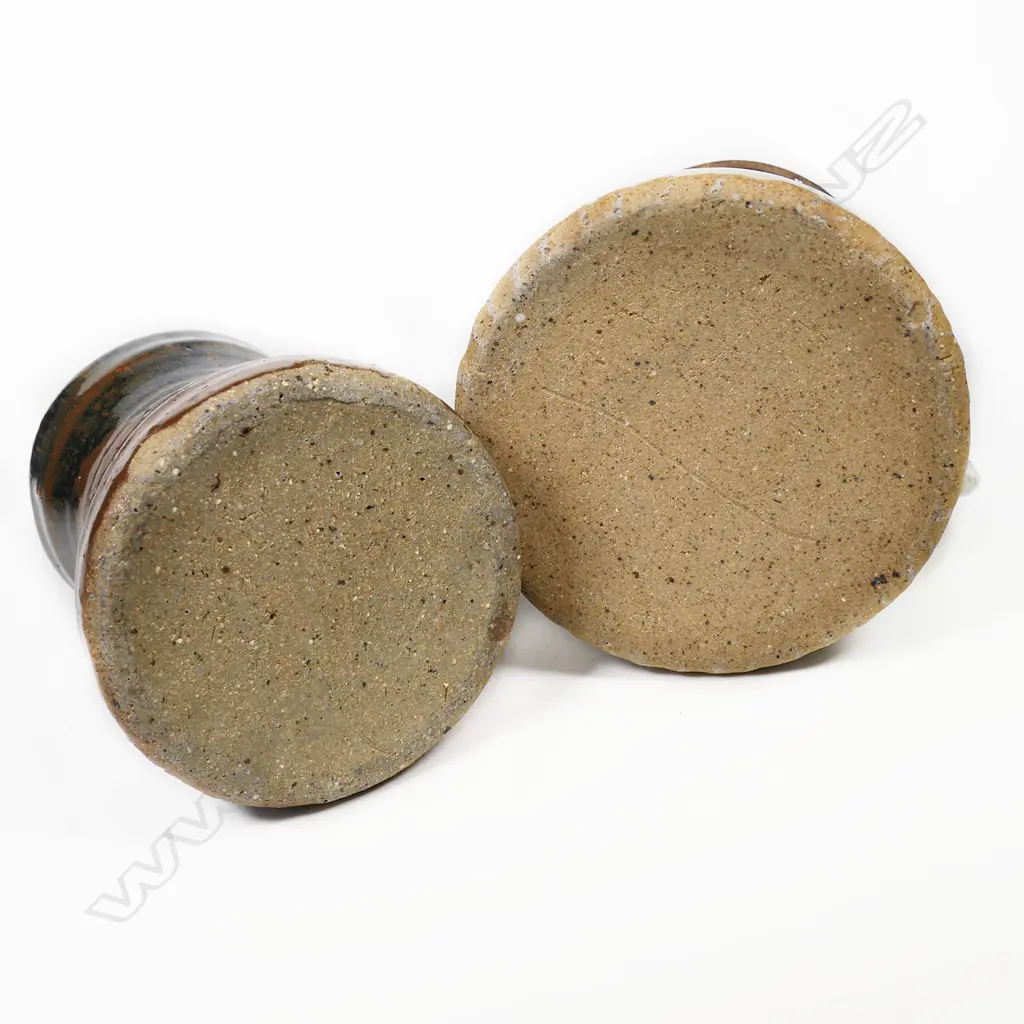 Mug and jug in the style of Barry Brickell. A tenmoko glazed mug with potter's mark (has small glaze loss) H.115. Jug has small 'r' impressed under handle, 125mm Image 1++