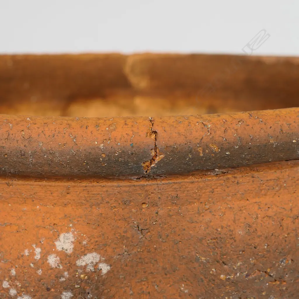 Barry Brickell (1935-2016) unglazed terracotta planter with flared body and lobed fluted walls. Impressed potter's mark to foot. Cracks to rim and aged surface. Dia.320mm. H.240mm Image 1++