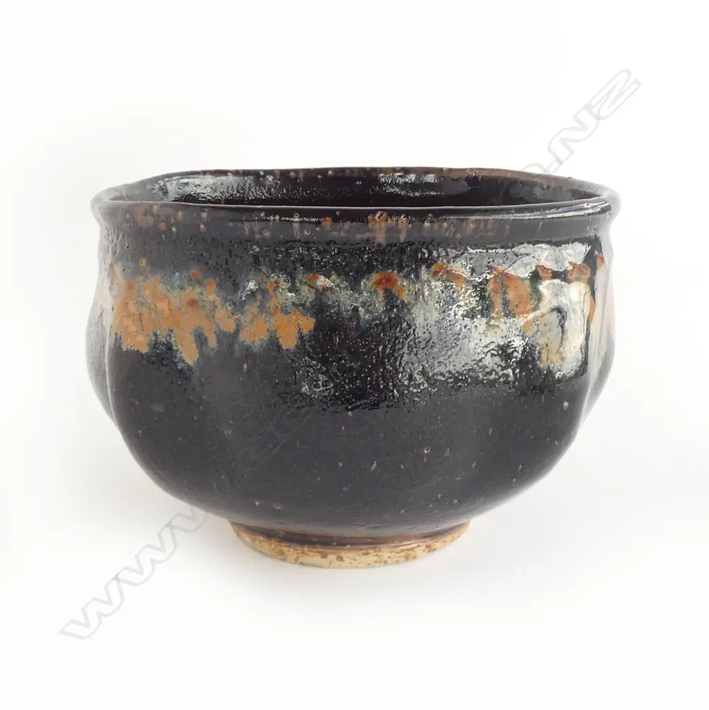 Barry Brickell (1935-2016) lobe sided stoneware bowl with lustrous tenmoko glazed square form with squiggle design under rim. Potter's mark impressed to side. H.150mm Image 1++