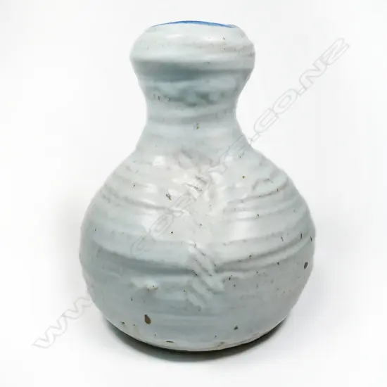 A large Len Castle (1924-2011) stoneware baluster form vase with swollen top and rounded banding
