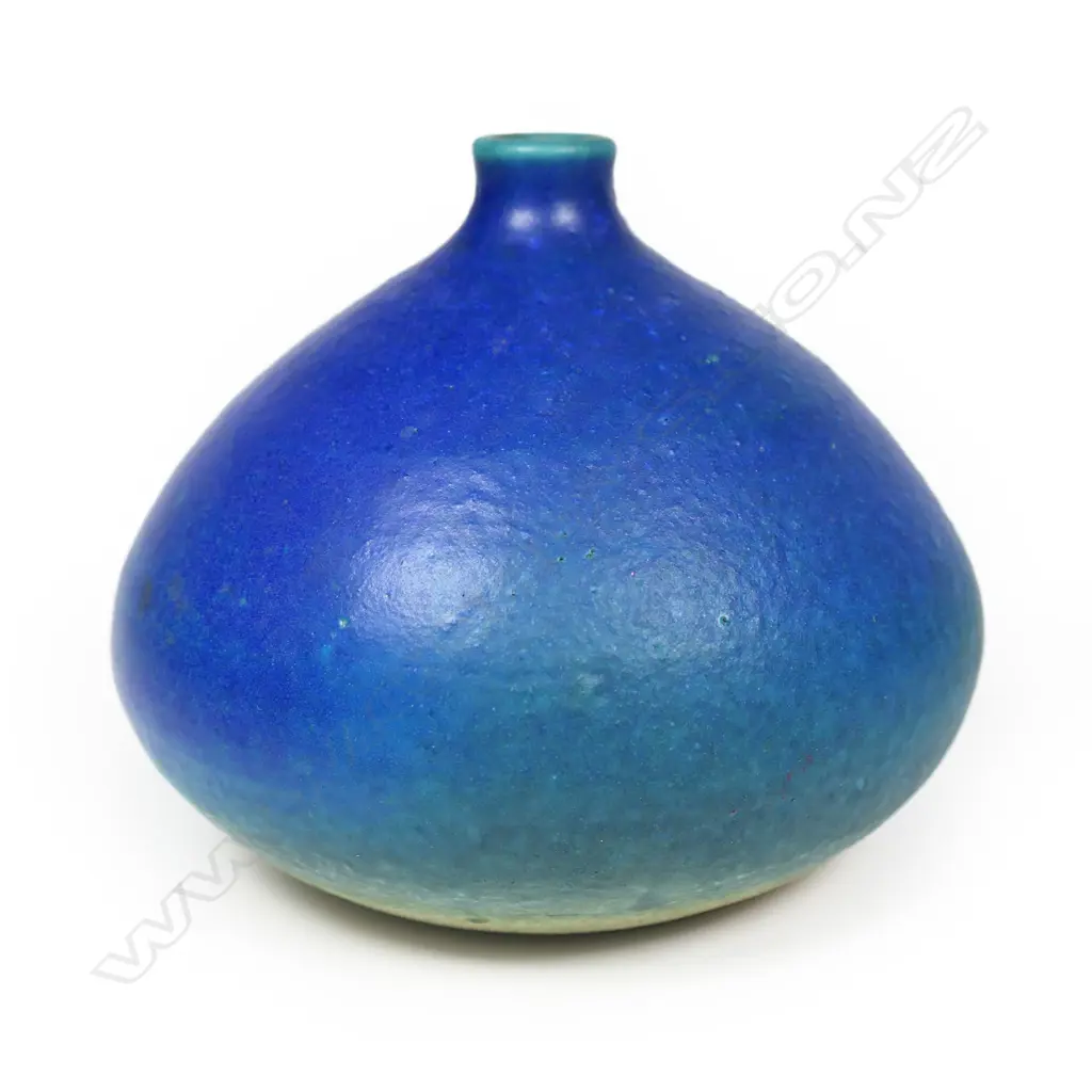 Len Castle (1924-2011) ovoid vase;  low lustre barium blue glaze with short lipped neck. Potter's mark lower side. H.90mm. Image 1++