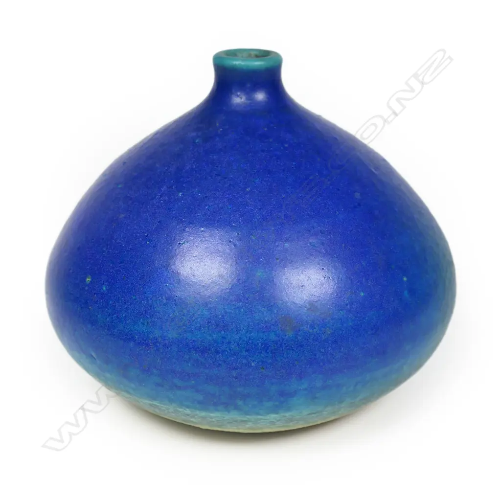 Len Castle (1924-2011) ovoid vase;  low lustre barium blue glaze with short lipped neck. Potter's mark lower side. H.90mm. Image 1++
