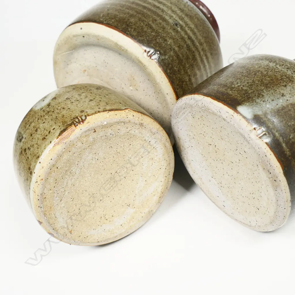 Three Len Castle spice jars with cork stoppers: Curry + Spice + Cayenne. Tallest 100mm. Vendor's note: Bought directly from the potter. Image 1++