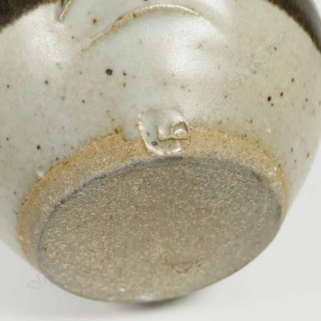 Len Castle jug spherical form ¾ dark green/brown glaze. Impressed mark. H.110mm. Vendor's note: Bought directly from the potter. Image 1++