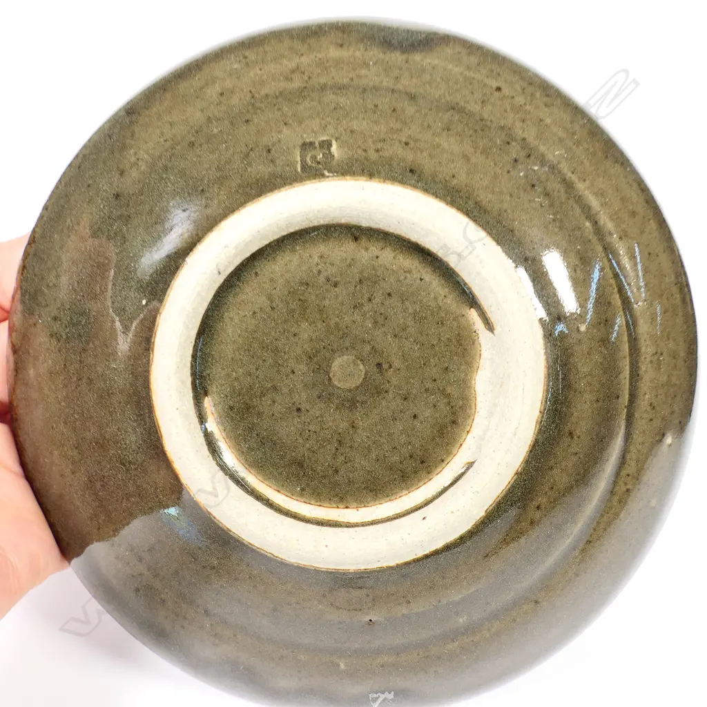 Len Castle small plate combed repeating decoration dark green/grey over tenmoku. Dia.165mm. Vendor's note: Bought directly from the potter. Image 1++