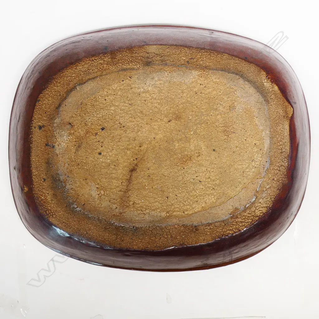 Len Castle large early press moulded dish of rounded rectangular form, impressed with various motifs and tenmoku overglaze. 410 x 330mm Image 1++