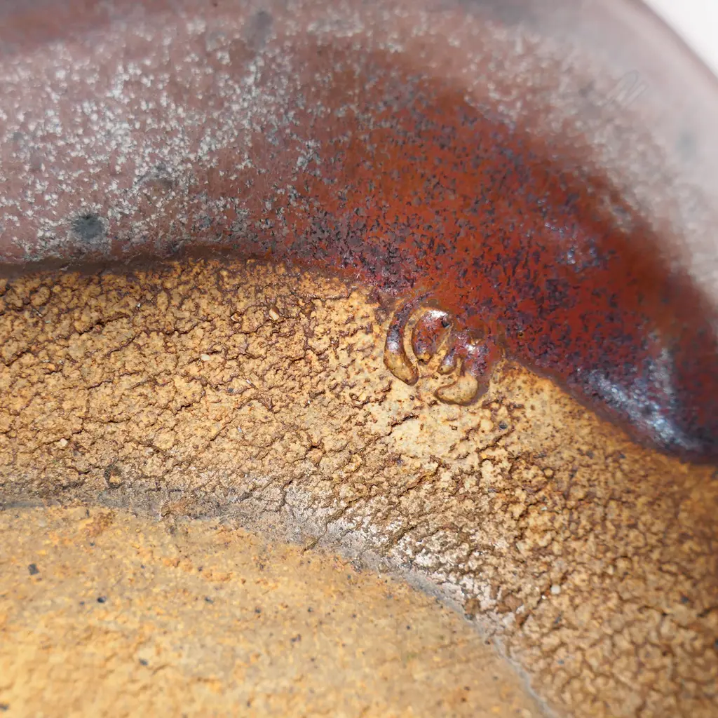 Len Castle large early press moulded dish of rounded rectangular form, impressed with various motifs and tenmoku overglaze. 410 x 330mm Image 1++