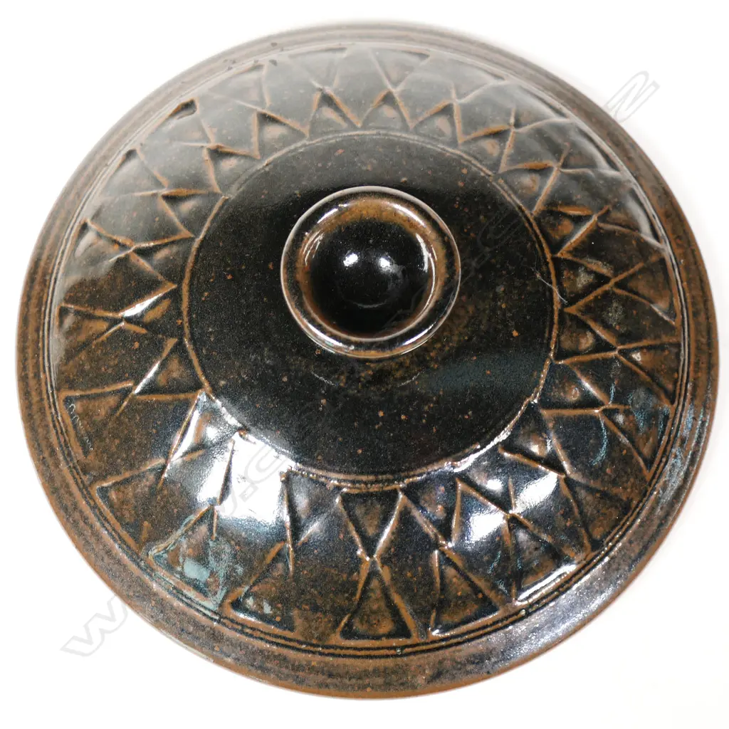 Mirek Smisek (1925-2013) lidded casserole dish. Tenmoko glaze with band of diamond trellis design to lid and sides. Potter's mark lower side. H.210mm Dia.230mm Image 1++