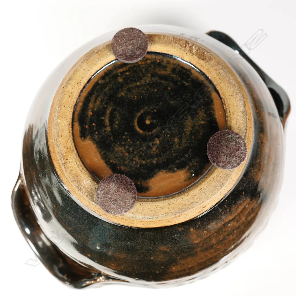 Mirek Smisek (1925-2013) lidded casserole dish. Tenmoko glaze with band of diamond trellis design to lid and sides. Potter's mark lower side. H.210mm Dia.230mm Image 1++