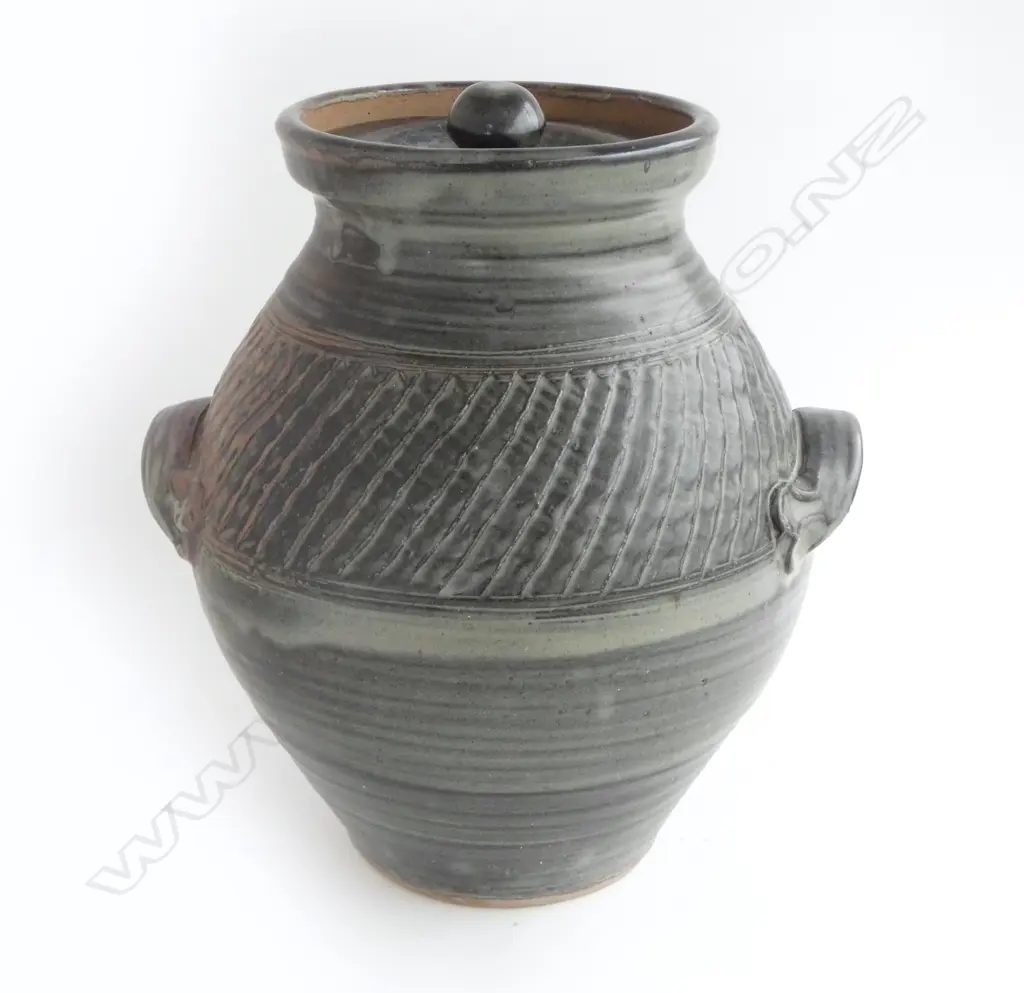 Mirek Smisek lidded floor pot with handles. Tenmoko and ash glazed body with a band of distinctive ribbing around upper body. H.400mm Image 1++