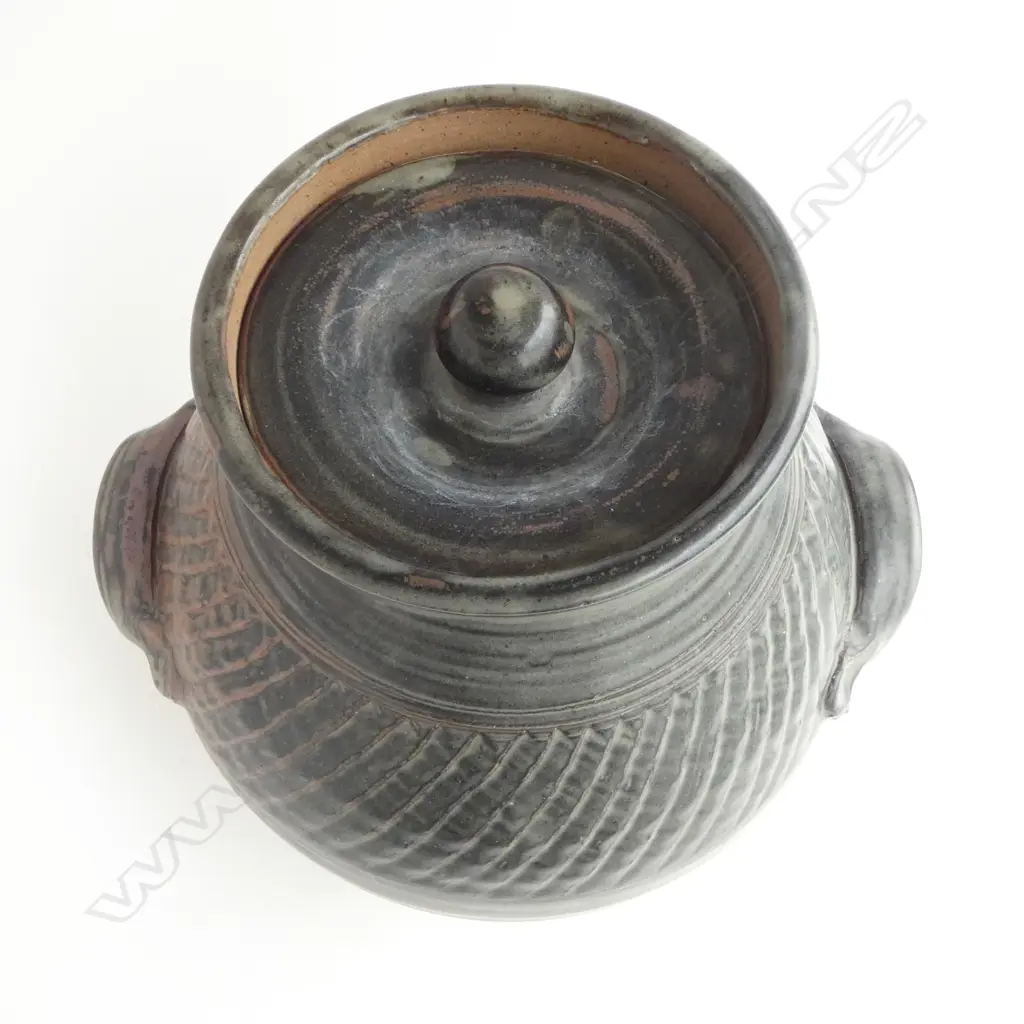 Mirek Smisek lidded floor pot with handles. Tenmoko and ash glazed body with a band of distinctive ribbing around upper body. H.400mm Image 1++
