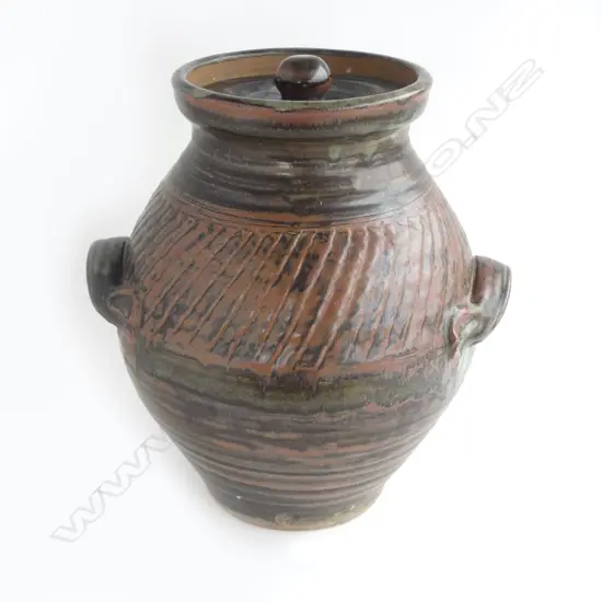 Mirek Smisek lidded floor pot with handles. Tenmoko and ash glazed body with a band of distinctive ribbing around upper body. H.400mm