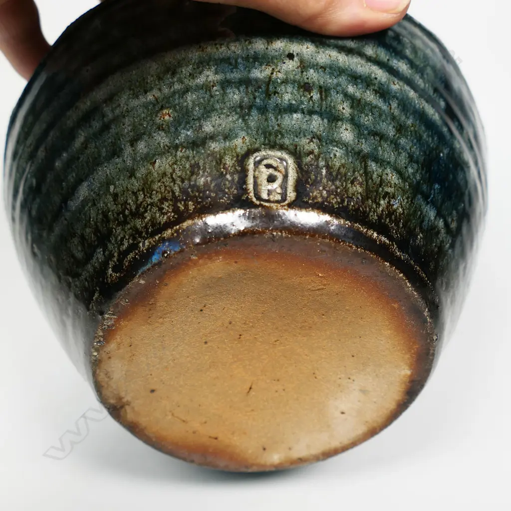 Peter Stichbury (1924-2015) 1960's/1970's salt glazed large biscuit barrel with cobalt blue tones, ridged lid with knob handle, small chip. Bamboo over-head handle. H.275mm. To top of handle. Image 1++