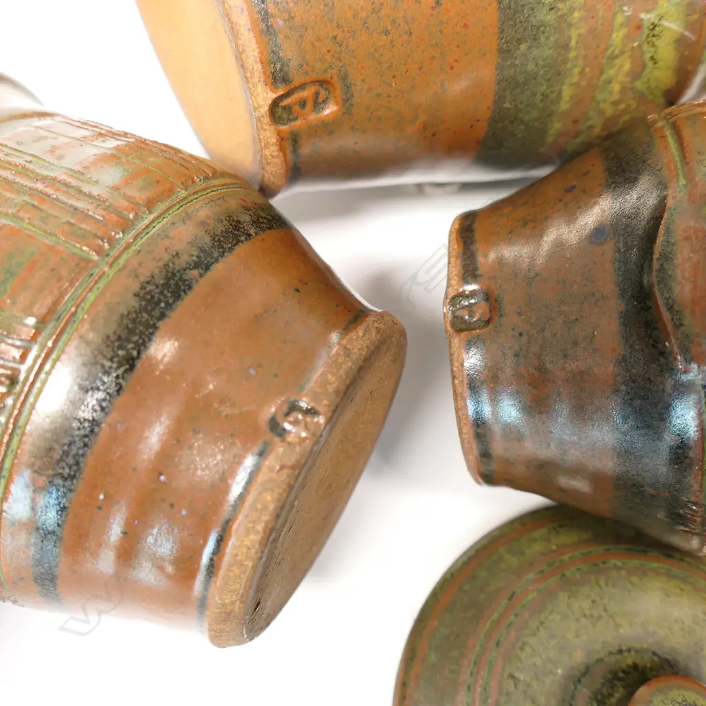 Peter Stichbury (1924-2015) three-piece coffee set - comprising coffee pot, lidded sugar and cream jug. Rock ash glaze. Vertical incised detail. Impressed potter's mark. H.240mm (coffee pot). Image 1++