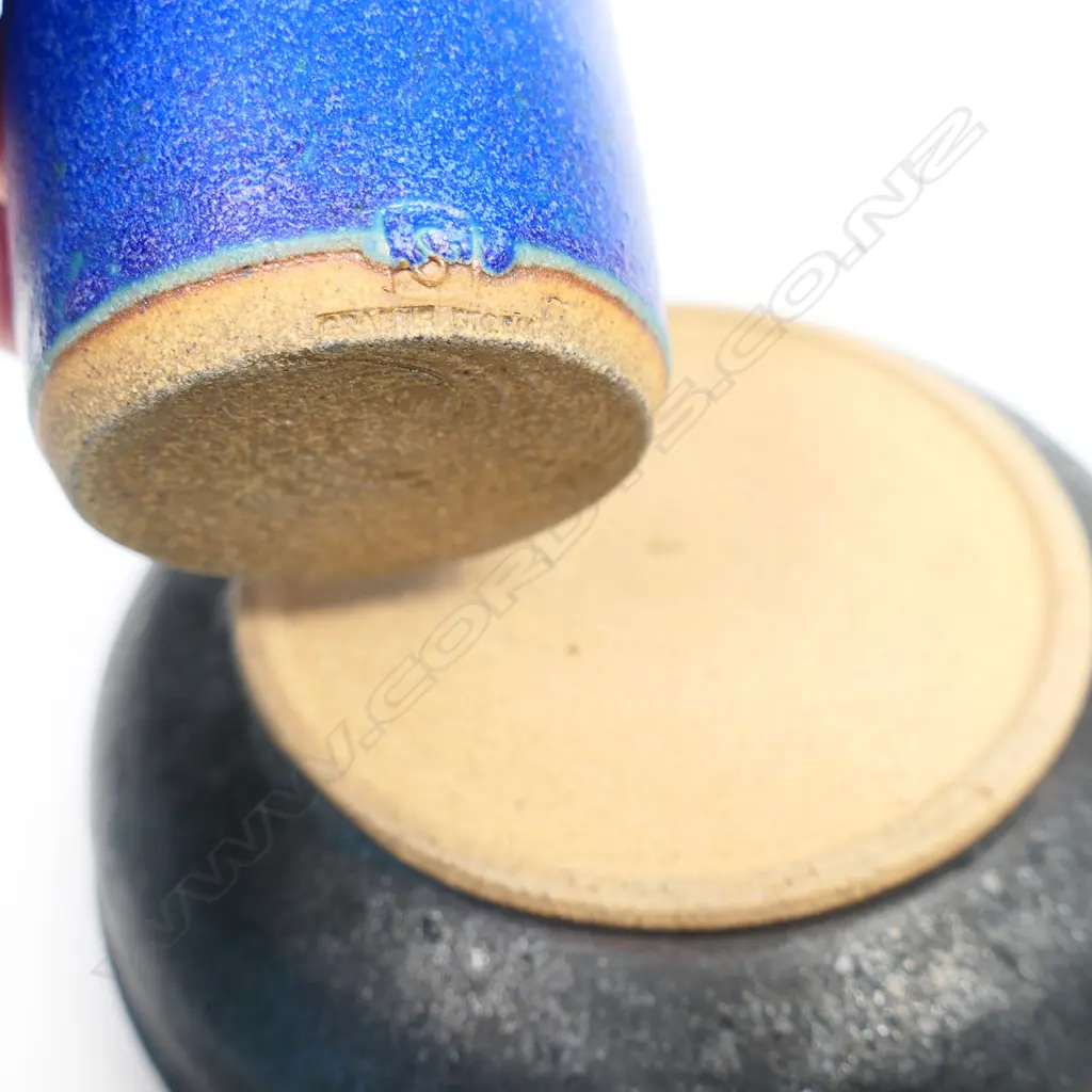 Two Graeme Storm (1936-) pottery pieces. Incised mark to bottle. Bowl Dia.170mm. Bottle H.140mm Image 1++