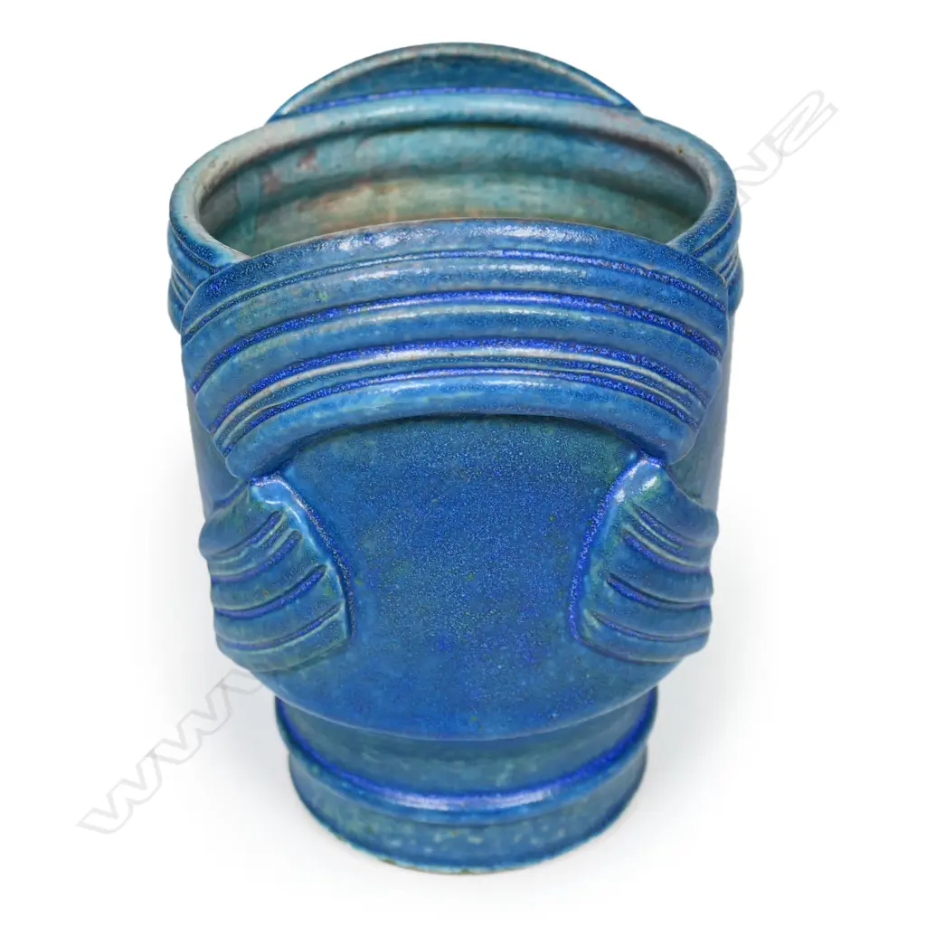 Graeme Storm urn vase with a barium blue glazed body and applied ribbed straps. Potter's mark to foot, H.165mm Image 1++