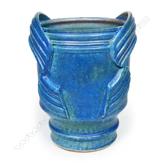 Graeme Storm urn vase with a barium blue glazed body and applied ribbed straps. Potter's mark to foot, H.165mm